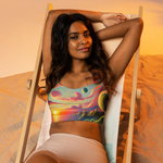 Pink Solitude Surreal Style Sports Bra with a bold and surreal design inspired by nature. Front sitting.